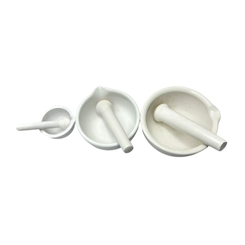 Chemistry lab puting ceramic porcelain mortar at pestle